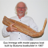 Guy Immega with model
 papyrus boat built by Buduma boatbuilder